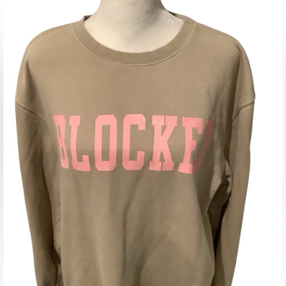 Tan Sweatshirt with Pink Text